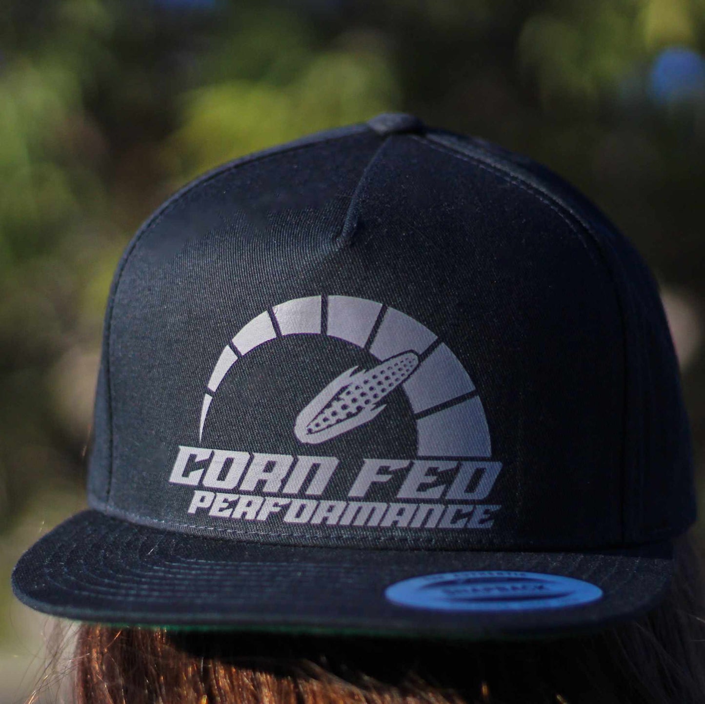 Black Corn Fed snapback hat with grey print and flat bill