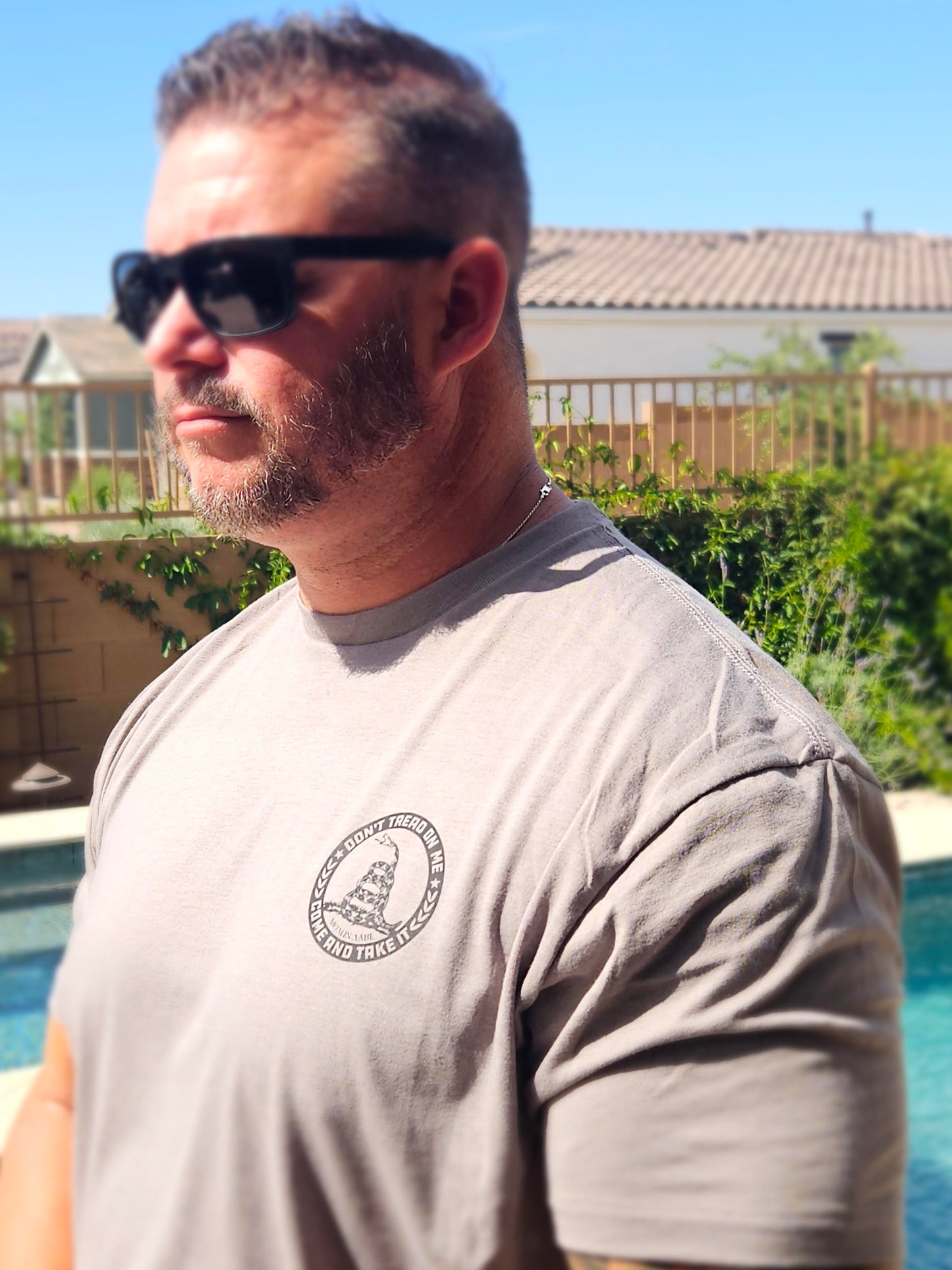 Short sleeve stone grey shirt with "Don't Tread on Me"