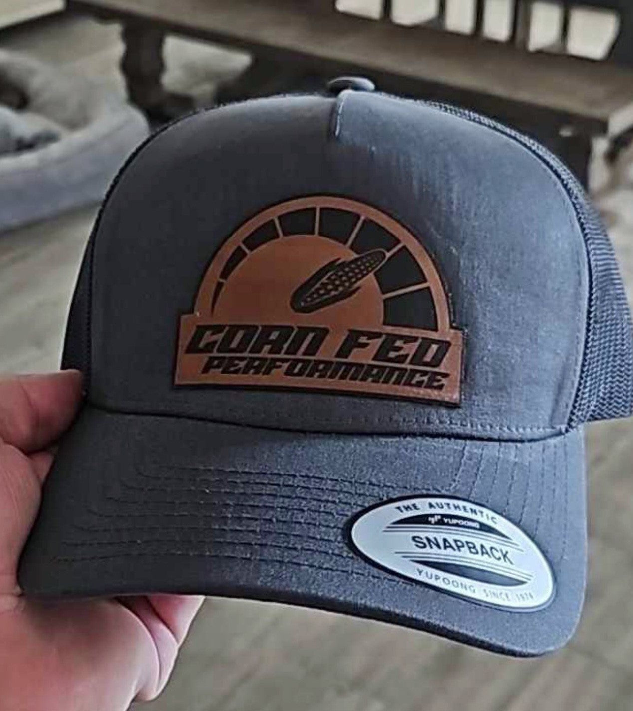 Dark grey/black snapback Corn Fed Performance hat