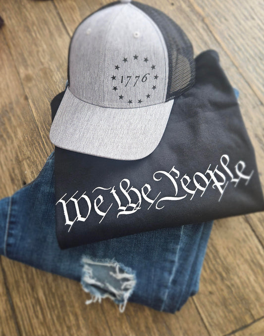 Grey and black mesh 1776 snapback with black We The People shirt