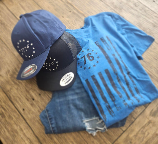 Blue 1776 t-shirt with black 1776 snapback or blue flexfit hat