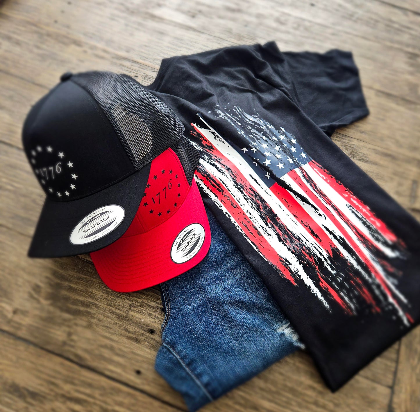 Black 1776 t-shirt with red and black snapback