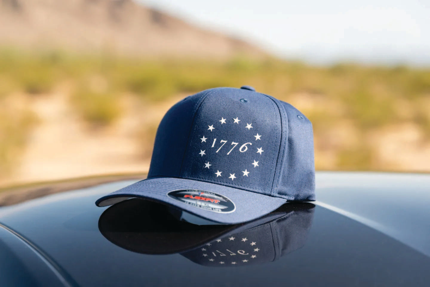 Navy blue snapback w 1776 white print